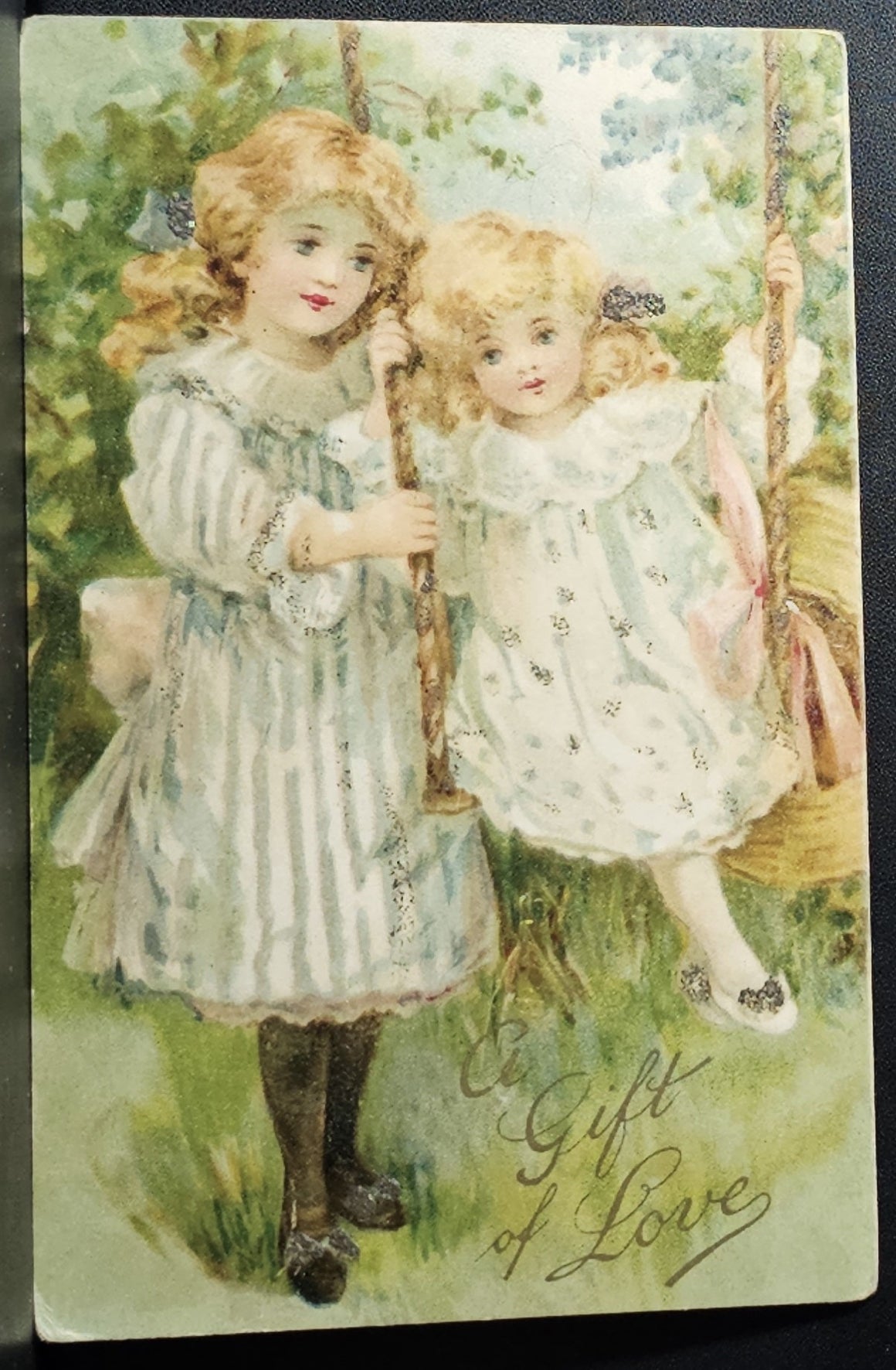 Valentine Postcard Little Girl Pushing Her Sister on Swing Applied Glitter Early Undivided Back