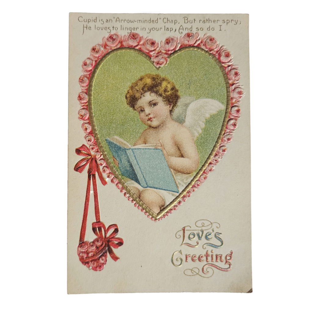 Vintage Valentine Postcard Cupid Reading Storybook In Heart Border