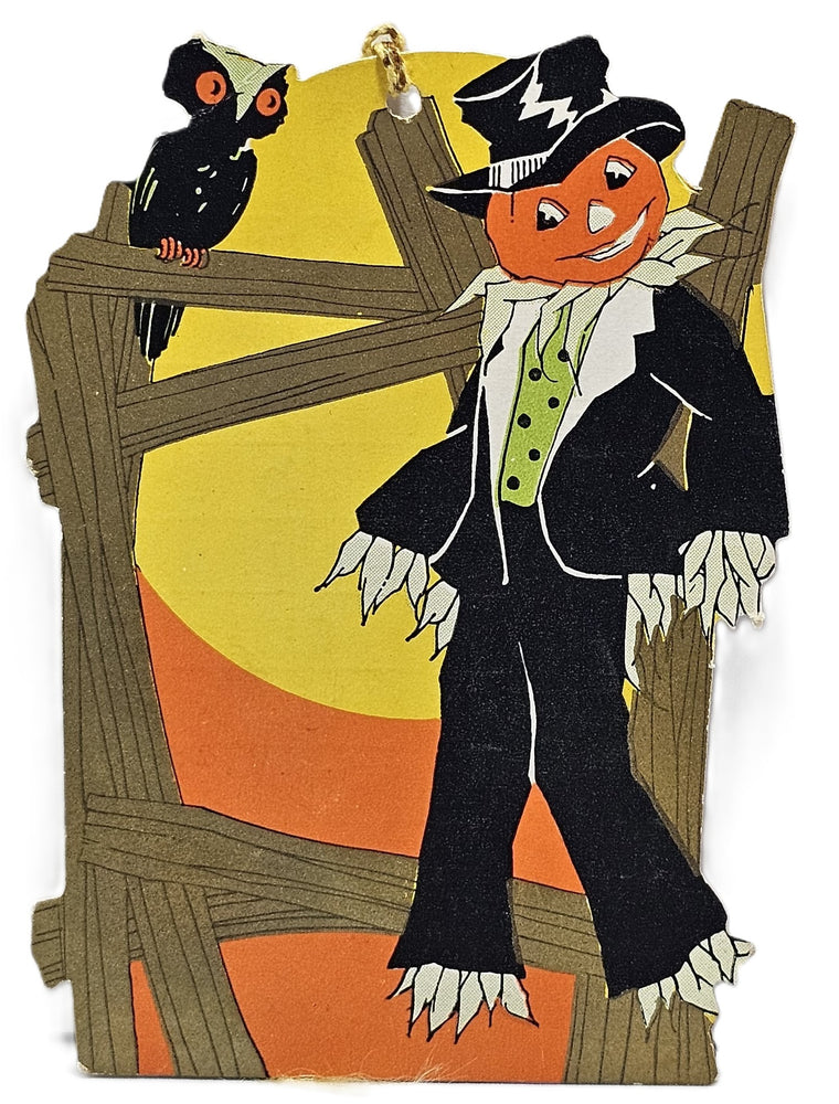 Vintage-style Halloween card with a scarecrow and owl on a wooden fence.