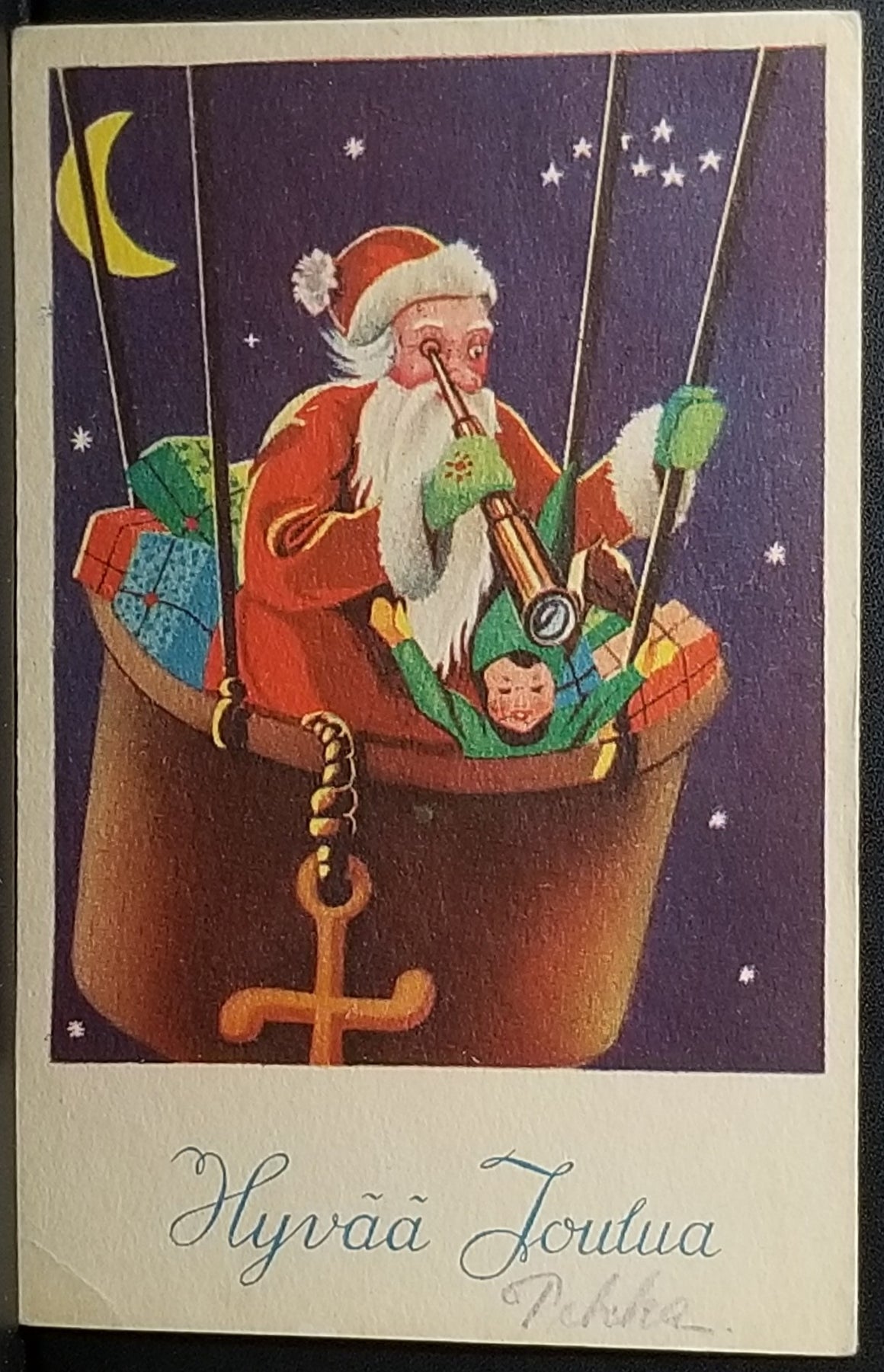 Christmas Postcard Finnish Santa Claus in Air Balloon Filled with Toys Under Night Sky Using Scope