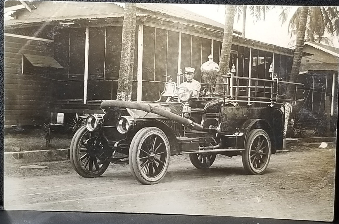 RPPC Real Photo Postcard Early 1900s Fire Truck With Driver Tropical Background with Palm Trees