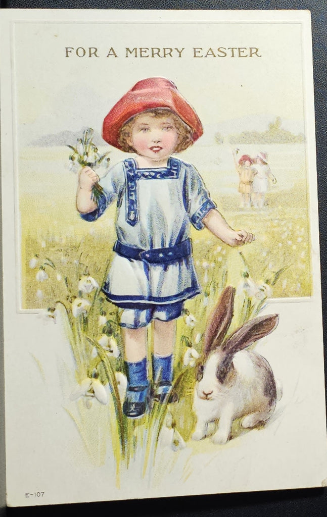 Easter Postcard Little Girl with Bunny Rabbit in Field of Flowers