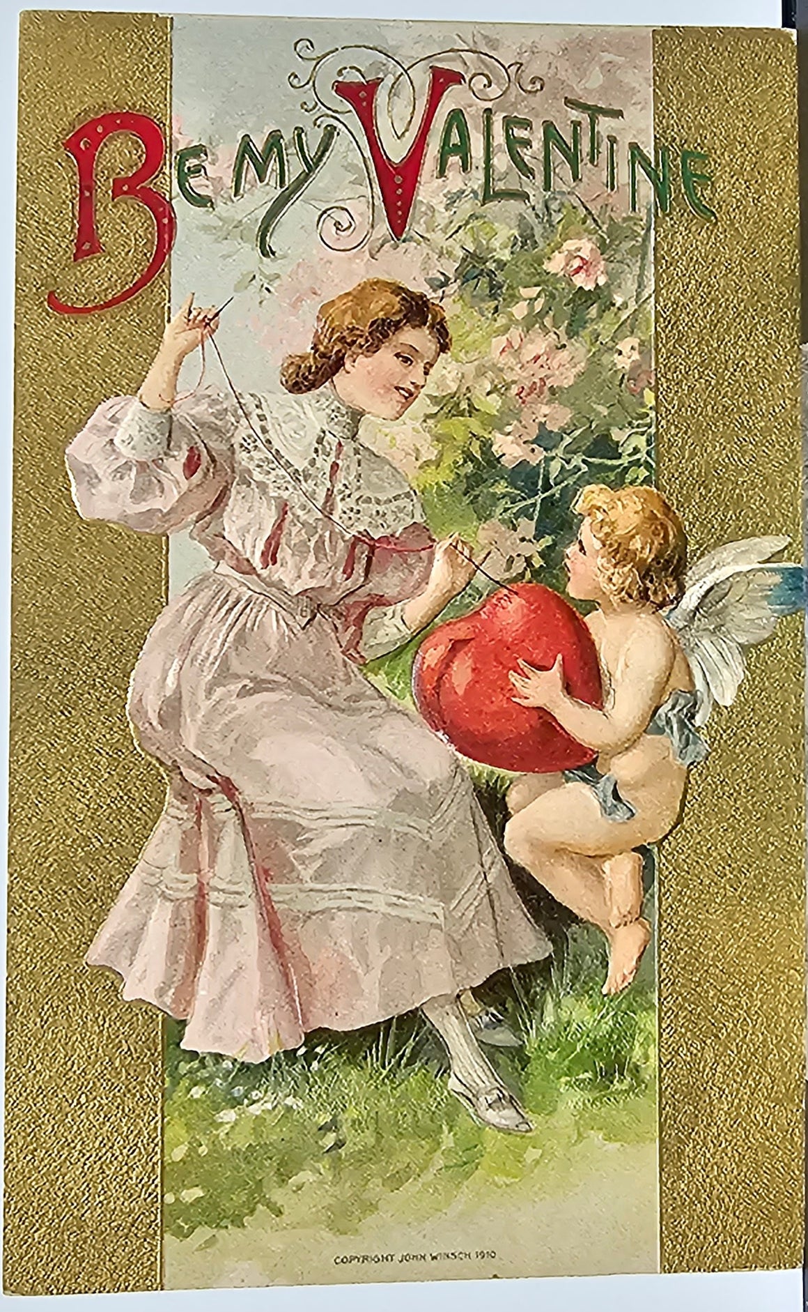 Valentine Postcard Winsch Publishing Woman with Cupid Gold Embossing