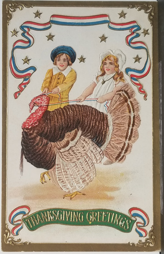 Thanksgiving Postcard Children Wrangling Turkey Gold Embossed American Flag Colored Ribbon Series 259