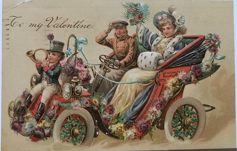 Valentine Postcard Woman with Chauffer Driver in Old Timey Car with Cupid on Hood PFB 7936 Motorcar Series