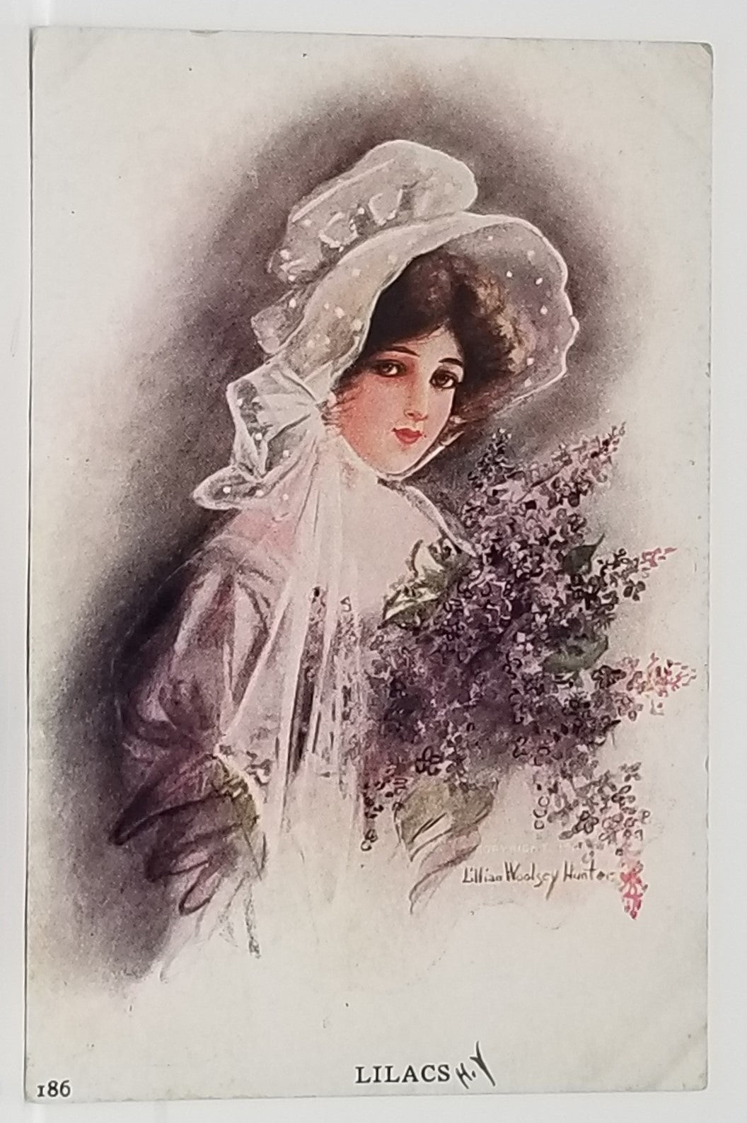 Artist Signed Postcard Woman in Purple Holding Lilacs Art Nouveau Lillian Woolsey Hunter National Art Company, Undivided Back