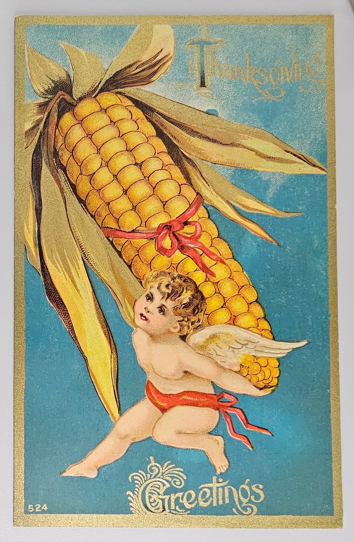 Thanksgiving Postcard Cherub Holding Giant Corn on Cob Series 524 Gold Highlights