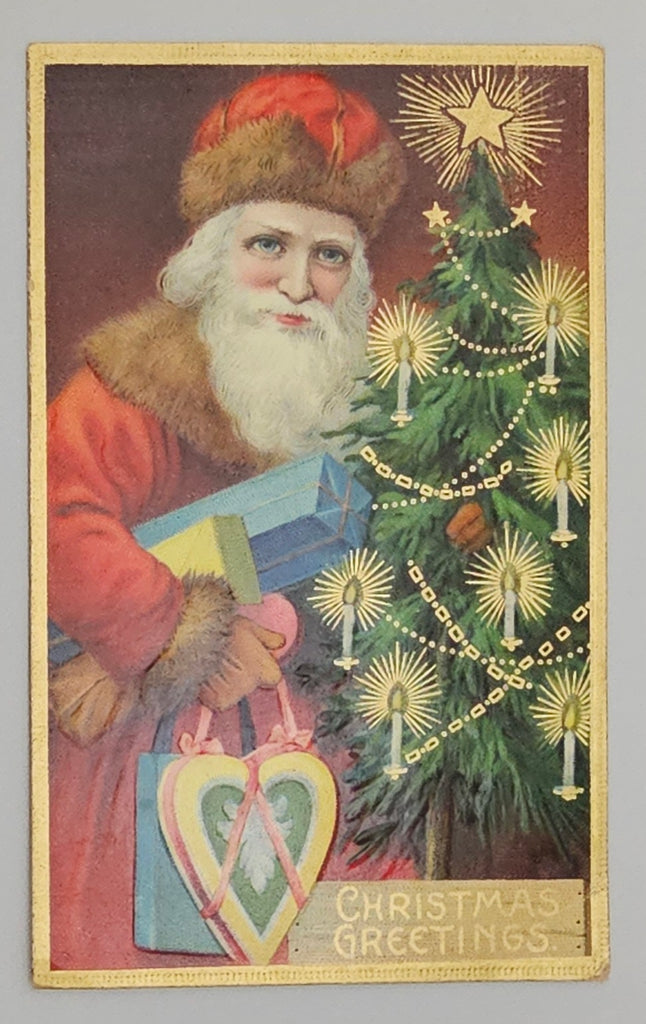 Christmas Postcard Santa Claus Old World St Nick Red Robe Standing Next to Tree Holding Heart Gift Gold Highlights Printed in Germany