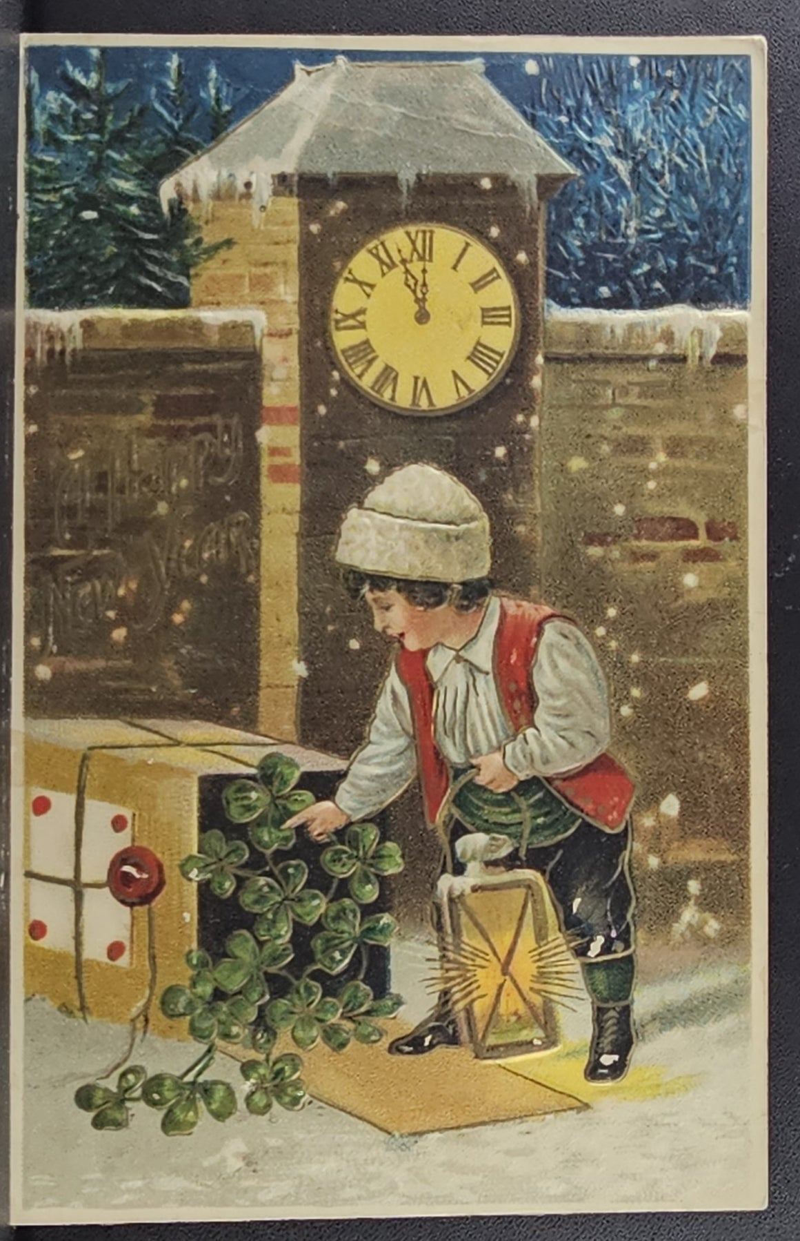 New Year Postcard Boy Opening Box of Four Leaf Clovers Under Clock at Midnight Gold Highlights