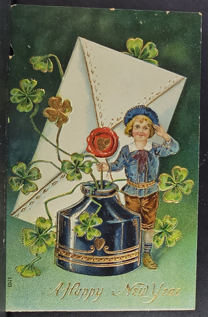 New Year Postcard Child Standing with Inkwell Envelope and Gold Four Leaf Clovers