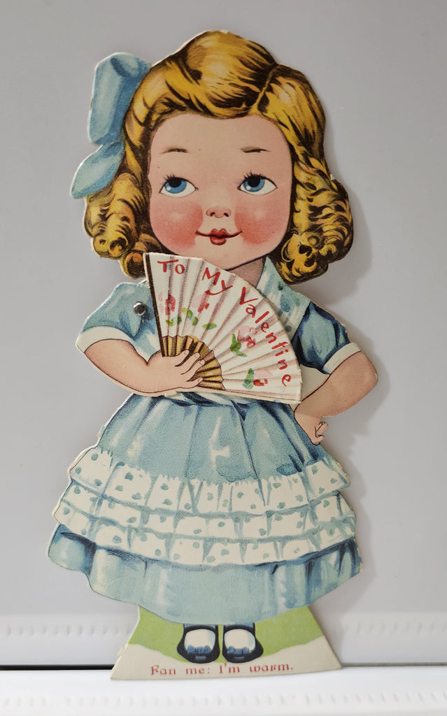 Antique Vintage Die cut Mechanical Valentine's Day Card Little Girl in Blue Dress Fan Me I'm Warm