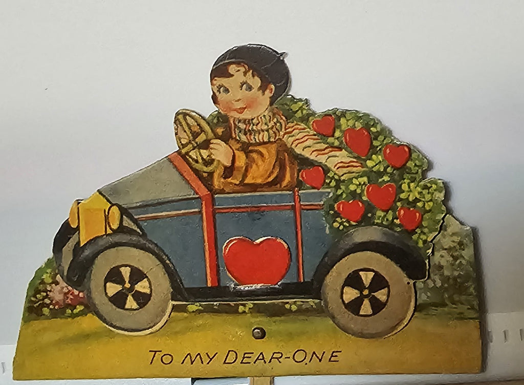 Vintage Die Cut Mechanical Valentine Card Little Boy Driving Car with Flower Hearts