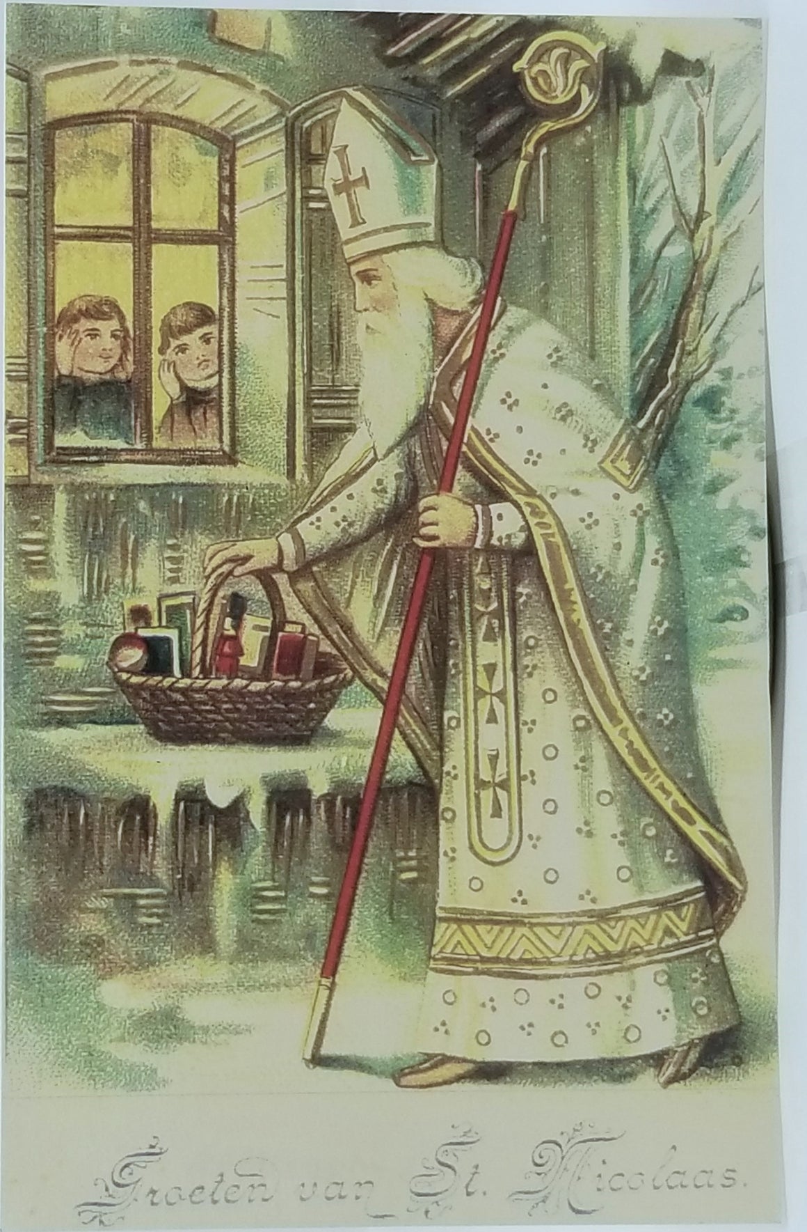 Christmas Postcard Old World White Robed Santa Claus Netherlands Leaving Basket at Window While Children Watch