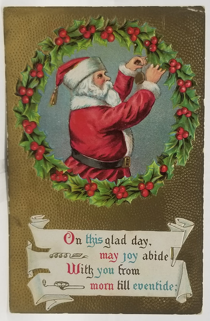 Christmas Postcard Red Robed Santa Claus Hanging Holly on Wreath Gold Background