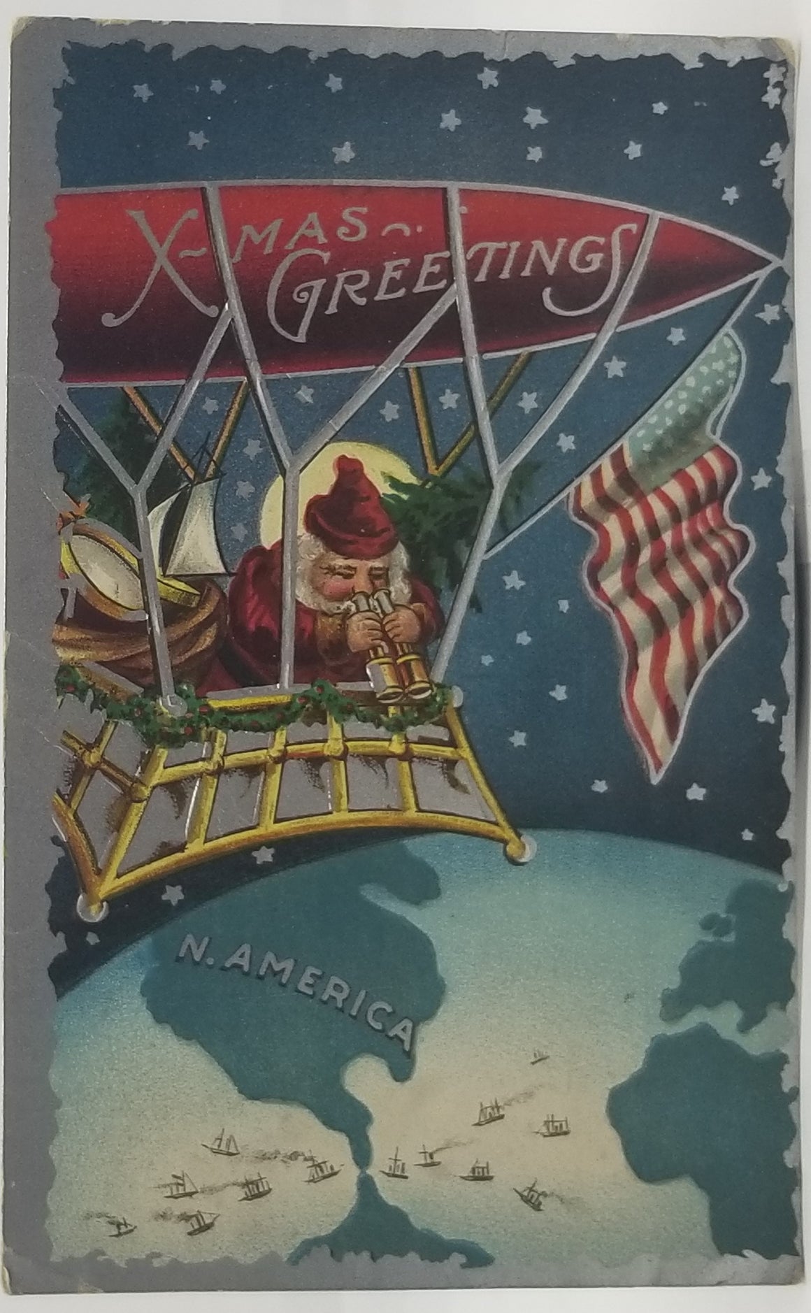 Christmas Postcard Santa Claus in Airship Zeppelin Over USA with Binoculars Holding American Flag Silver Trim
