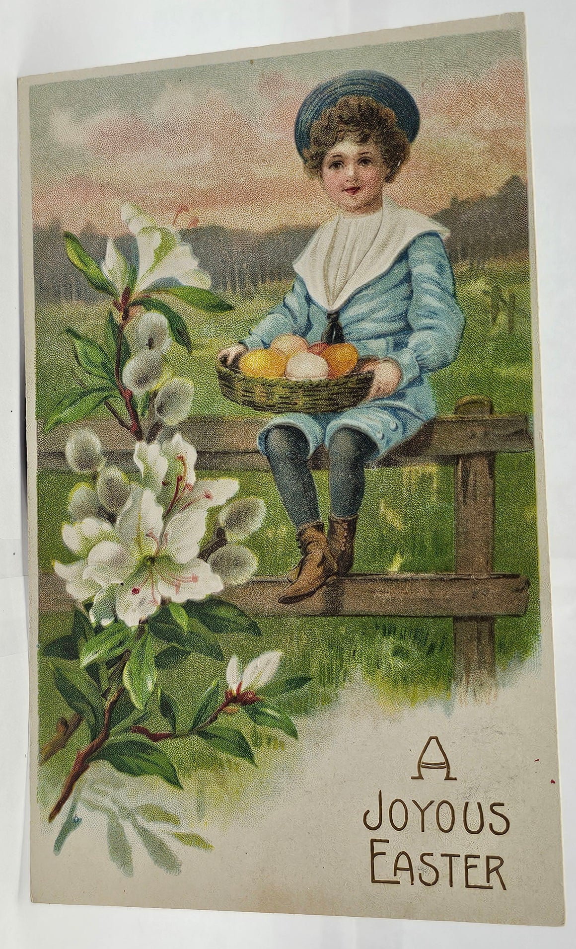 Easter Postcard Little Boy Sitting on Fence Holding Eggs Gold Embossed Series 289