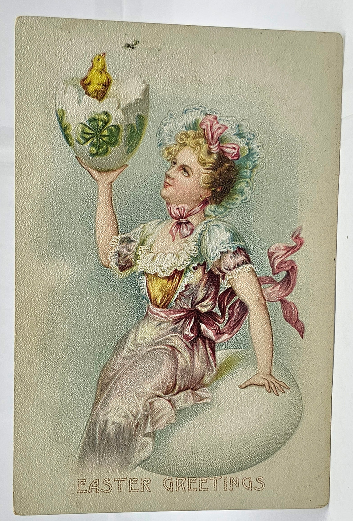 Easter Postcard Edwardian Woman in White Seated on Giant Egg Holding Hatched Baby Chick Early Undivided Tuck
