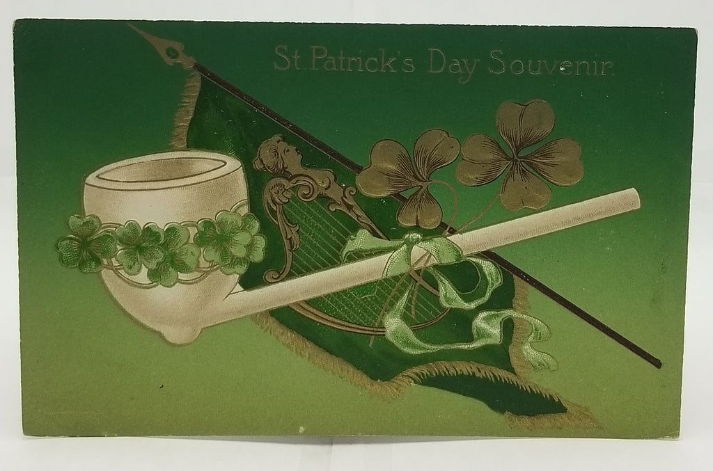 St Patrick's Day Postcard Gold Embossed White Pipe with Shamrock Clover Over Irish Flag John Winsch Publishing