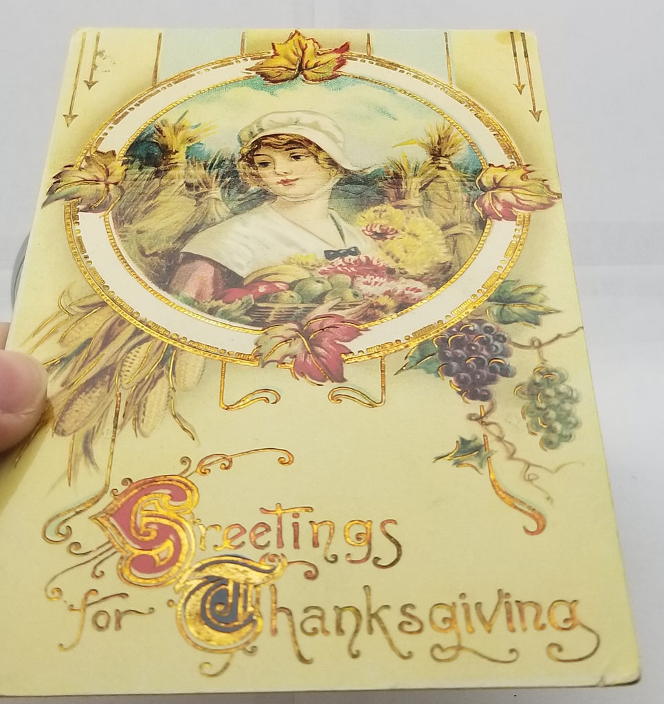 Thanksgiving Postcard Pilgrim Maiden with Flowers & Fruit Haystacks Gold Highlights Gel Like Finish