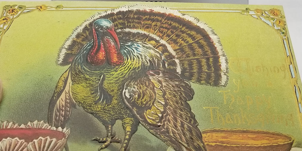 Thanksgiving Postcard Turkey in Green Background Standing with Pies and Desserts Embossed Card