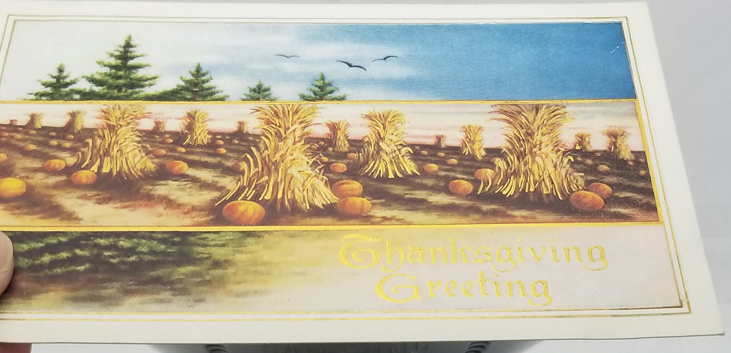 Thanksgiving Postcard Embossed Haystacks Field in Blue Sky with Birds Flying Gold Highlights