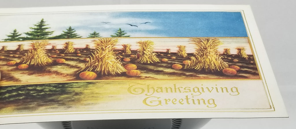 Thanksgiving Postcard Embossed Haystacks Field with Pumpkins Under Blue Sky with Birds Flying Gold Highlights