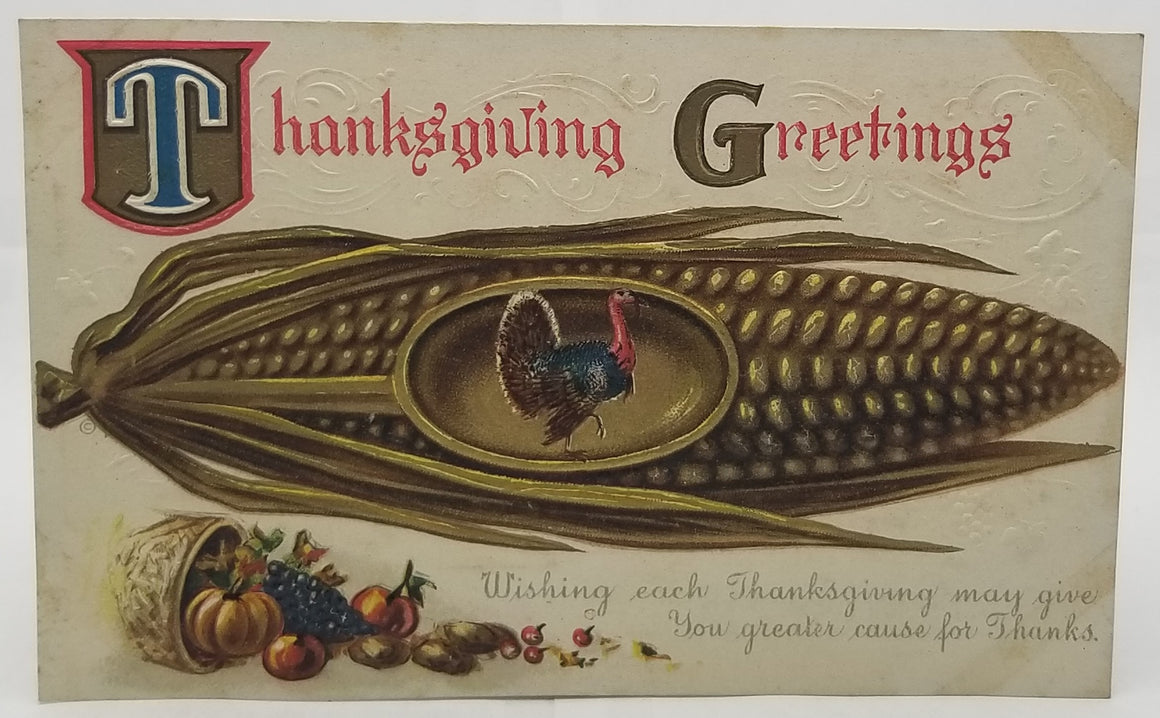 Thanksgiving Postcard Turkey Image Inside Giant Cob of Corn Gold Highlights with Scattered Fruits JJ Marks Series 959