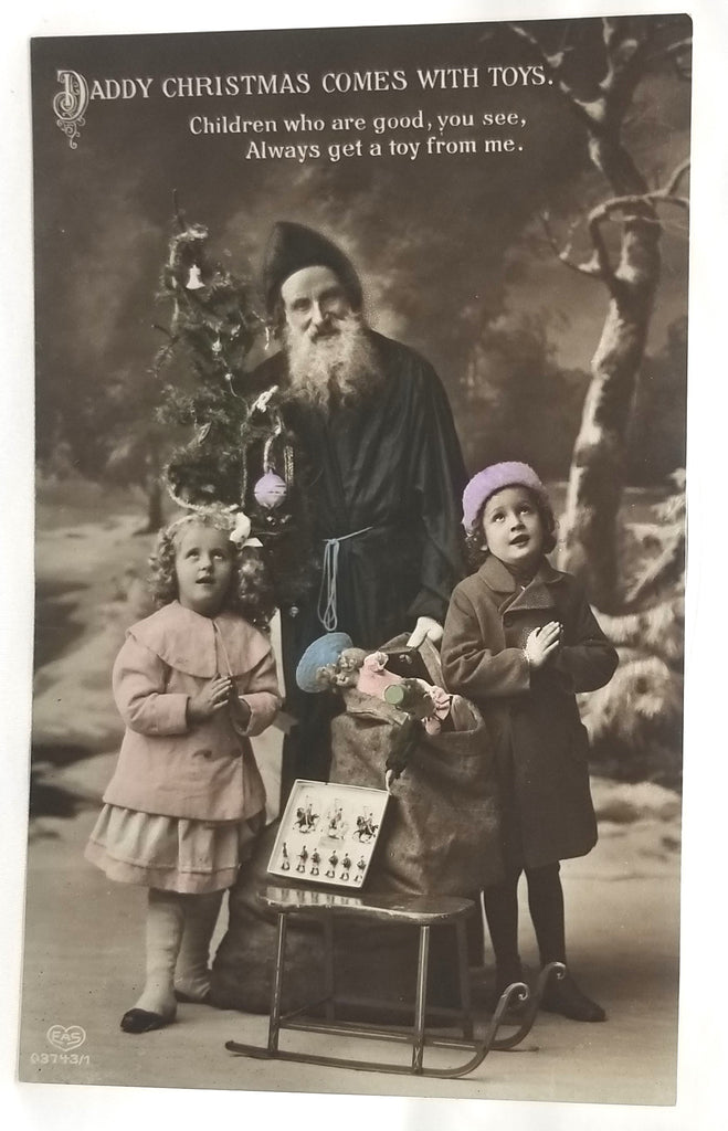 Christmas Postcard Santa Claus RPPC Real Photo St Nicholas Pulling Sleigh of Toys with Children Hand Tinted