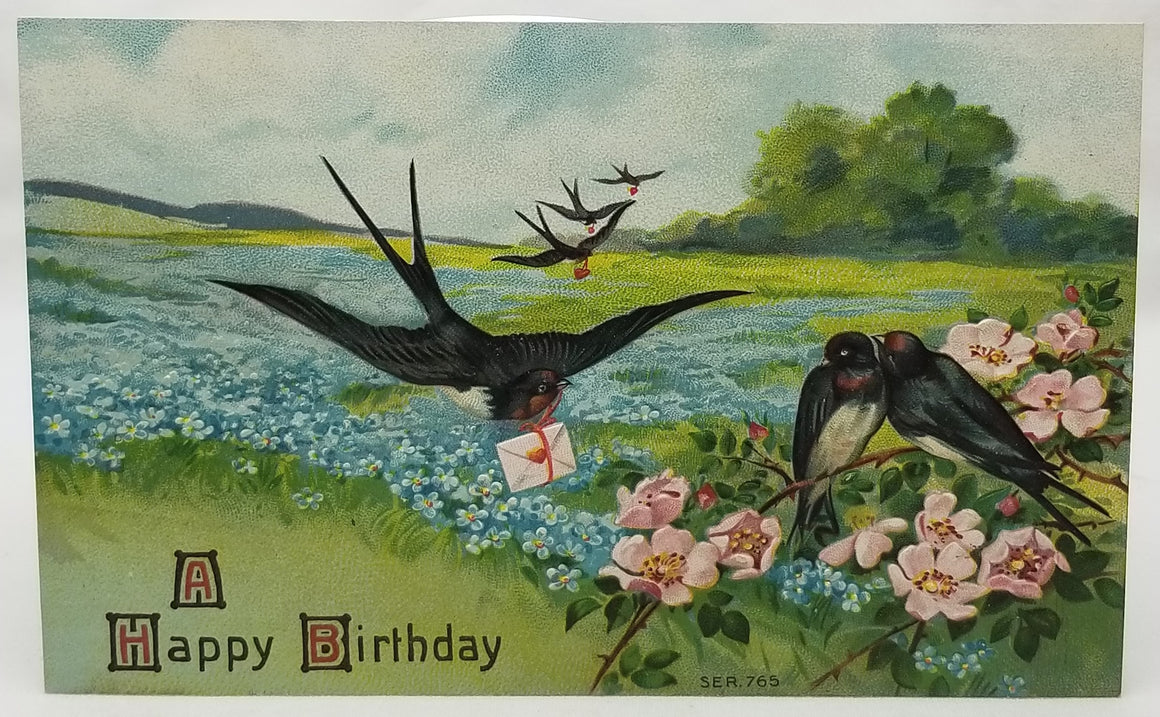 Greetings Postcard Happy Birthday Embossed Unused Card Swallows Carrying Envelopes with Hearts Flying Over Blue & Pink Flower Fields