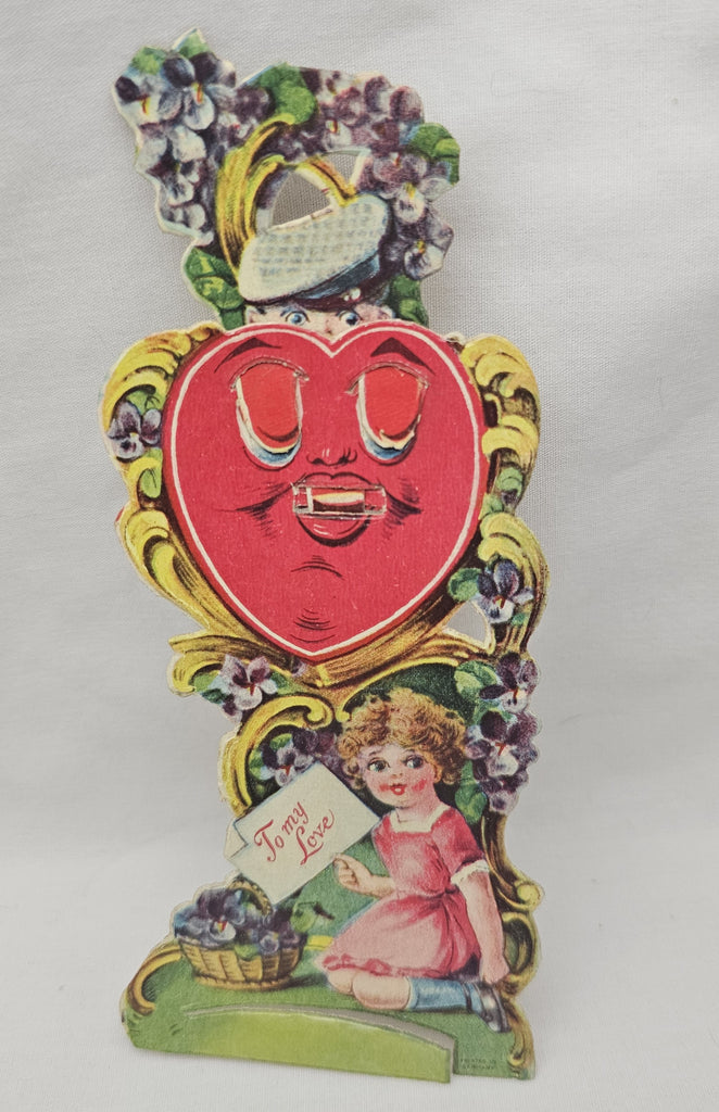 Vintage Mechanical Die Cut Valentine Card, 1930s German Valentine's, Little Girl with Boy in Mailman Hat Pops Out Heart with Eyes