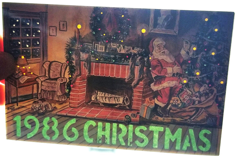 Christmas Postcard HTL Santa Claus by Fireplace 1986 Artists Dennis Mallory & Gayle Polsinello