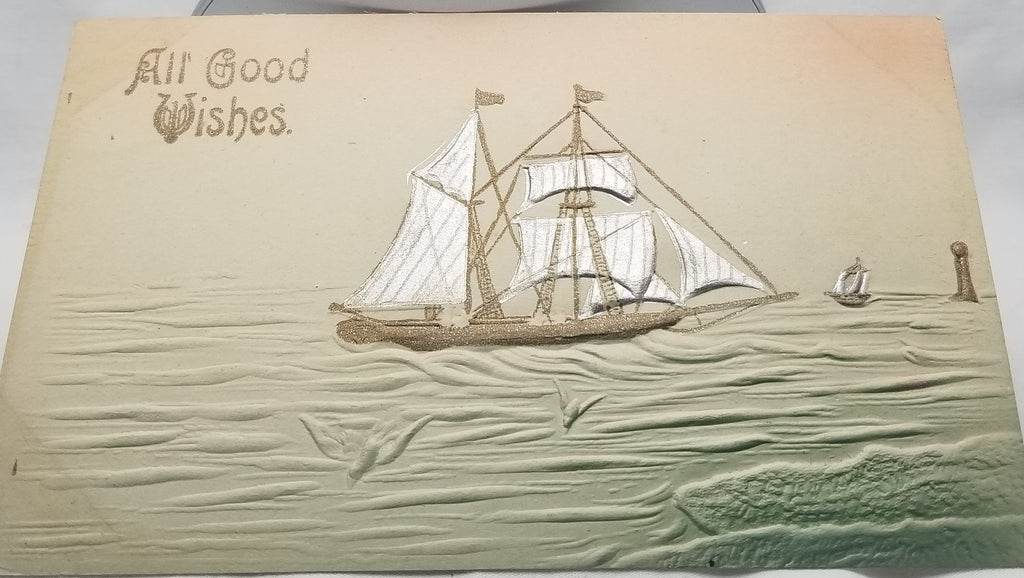 Greetings Postcard Best Wishes Embossed Card with Silver & Gold Sailboat on Ocean Airbrush Style with Orange Sky