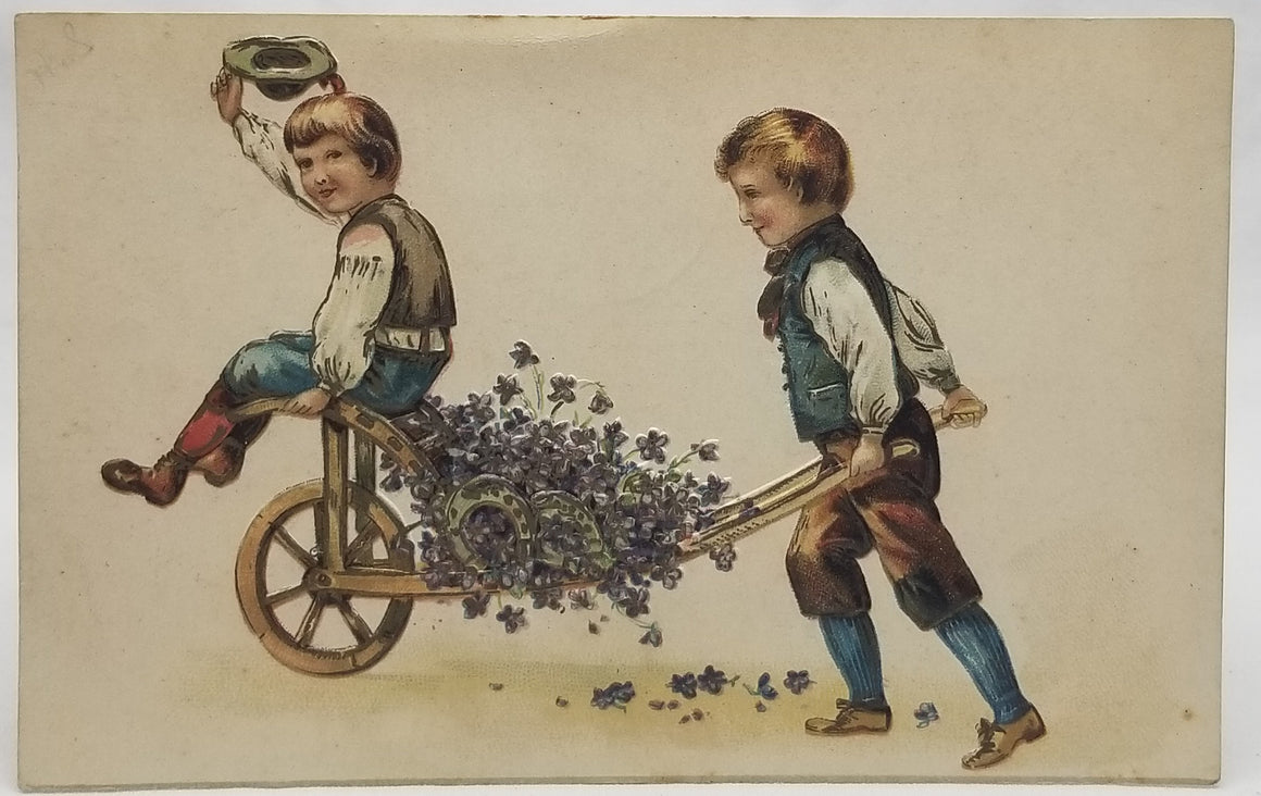 Embossed Greetings Postcard Boy Pushing Brother in Flower Wagon