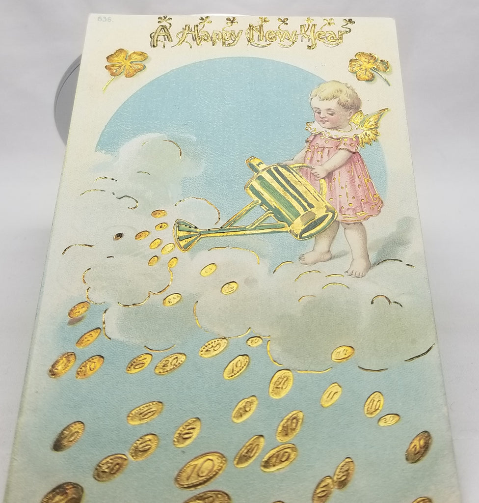 New Year's Postcard, Vintage Post Card of Cherub Angel Watering Gold Coins Falling From Heaven Gel Like Finish