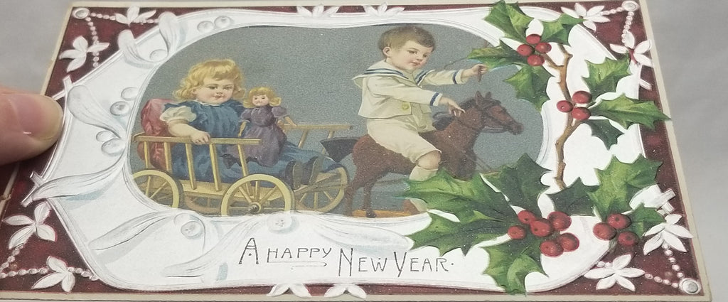 New Year's Postcard, Vintage Post Card Silver Embossed Red Background Children with Rocking Horse