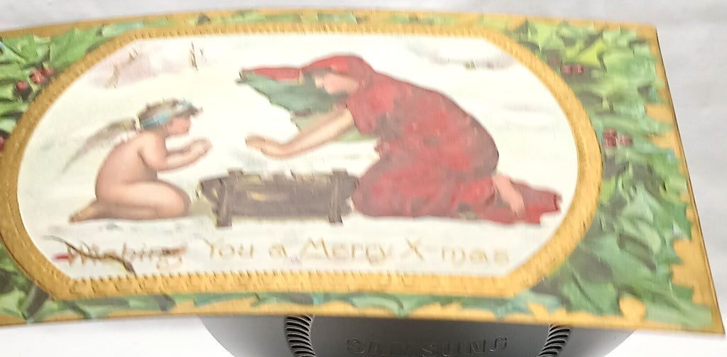 Christmas Postcard Gold Embossed Woman in Red with Angel Over Fire in Snow