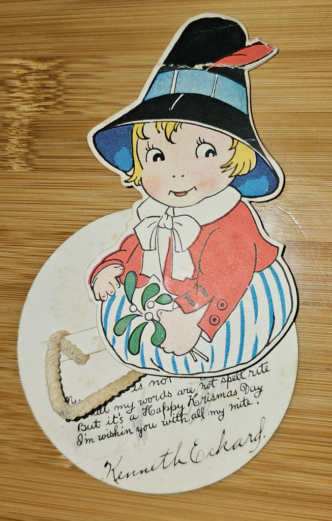 Vintage Merry Christmas Child in Hat Bouncing String