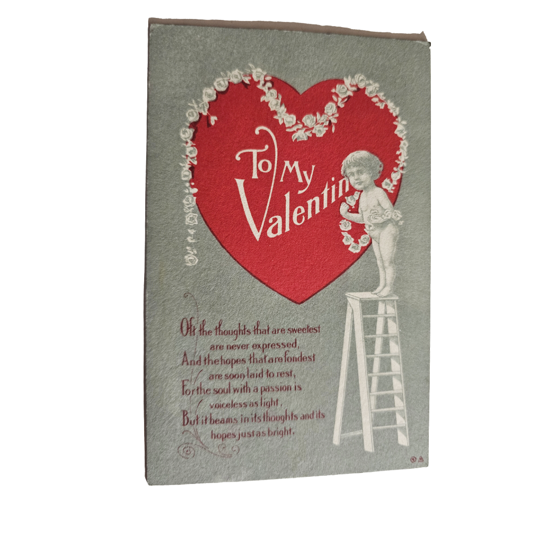 Valentine Postcard Silver Embossed Cupid Hanging White Flower Wreath on Heart