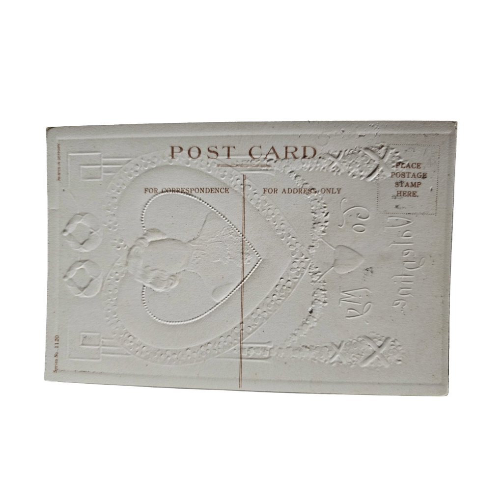 Valentine Postcard Embossed Man In Giant Red Heart w/Flowers