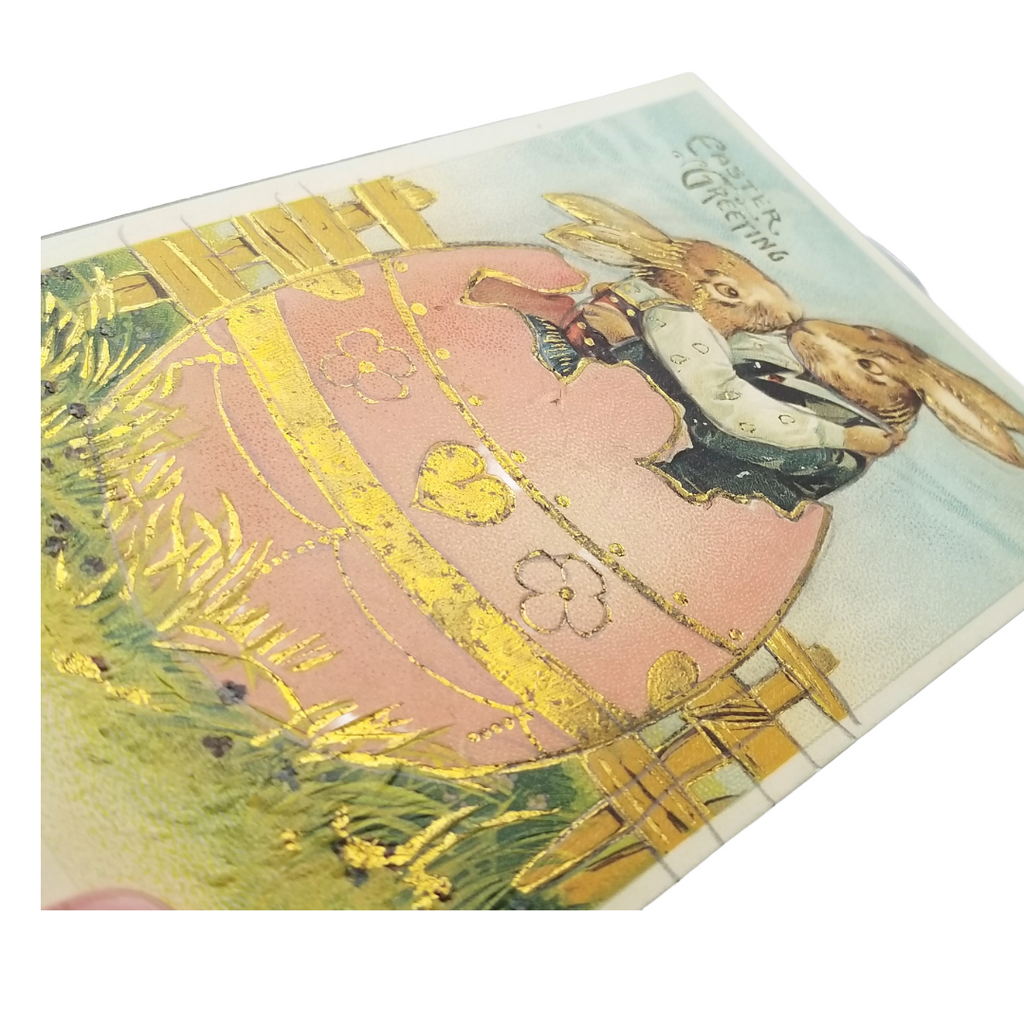 Easter Postcard Embossed Anthropomorphic Bunnies In Giant Pink Egg Gold Gilded
