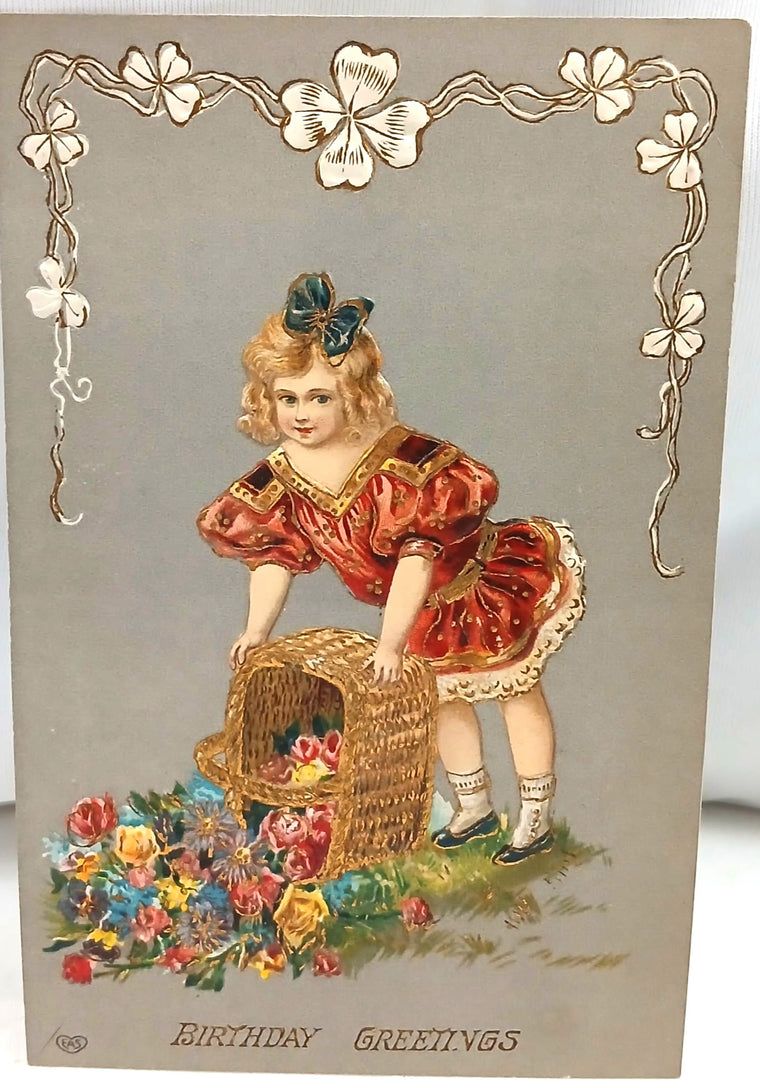 Vintage-style greeting card with a child holding a basket of flowers and decorative elements.