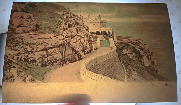 HTL Hold to Light Postcard Llandudno Lighthouse Wales England B&W Turns Color Image