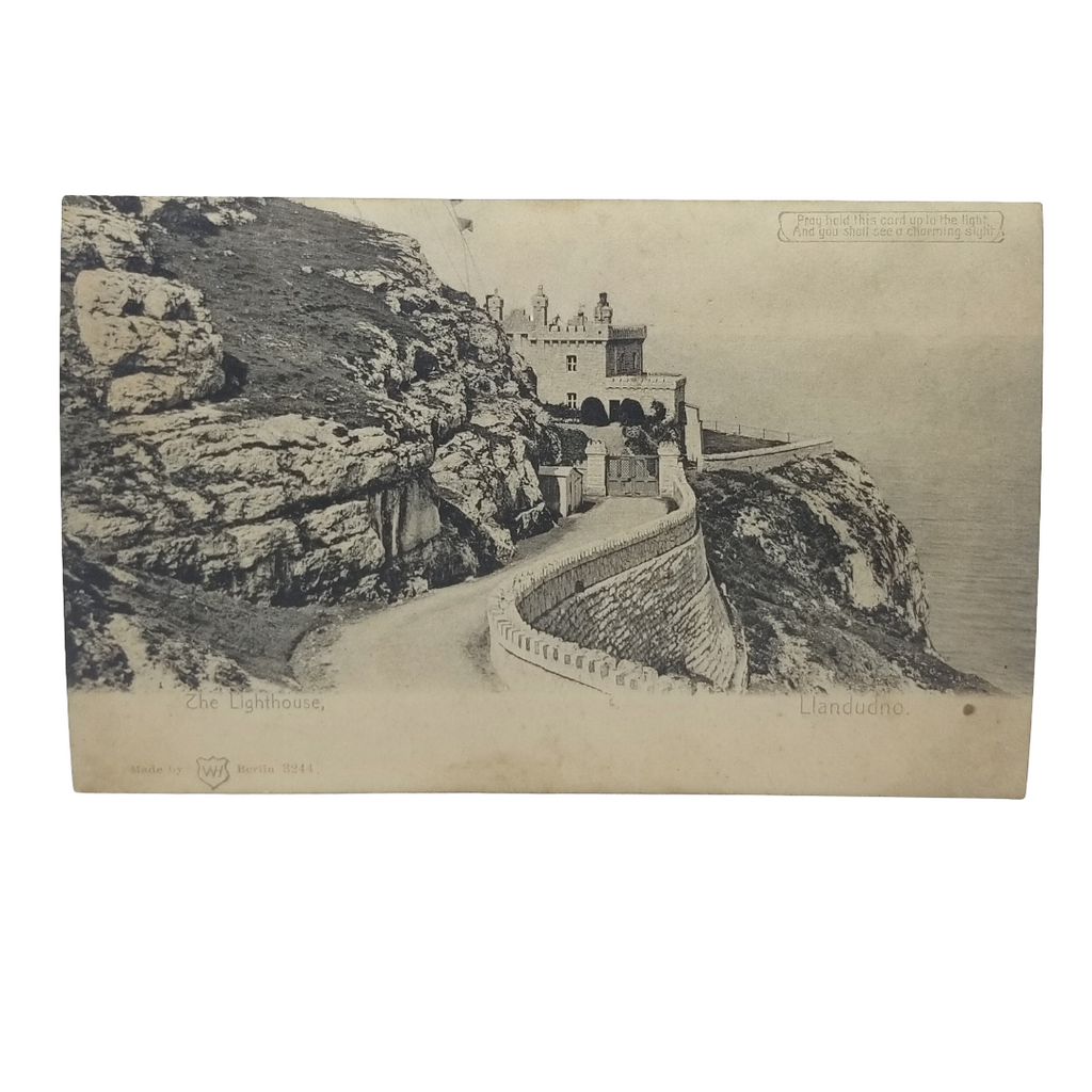 HTL Hold to Light Postcard Llandudno Lighthouse Wales England B&W Turns Color Image