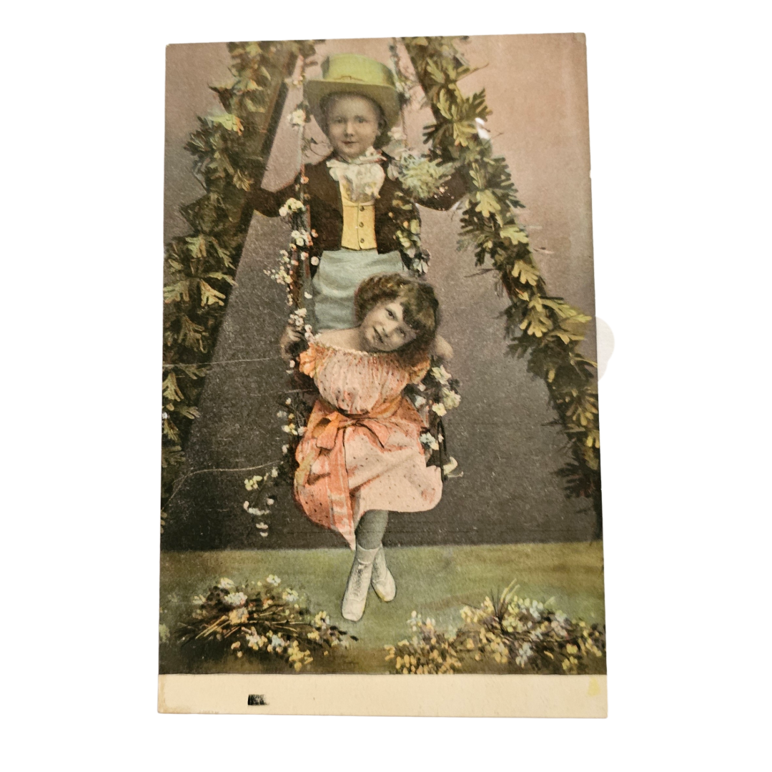 Real Photo Studio Two Children Dressed Up on Flower Covered Swing