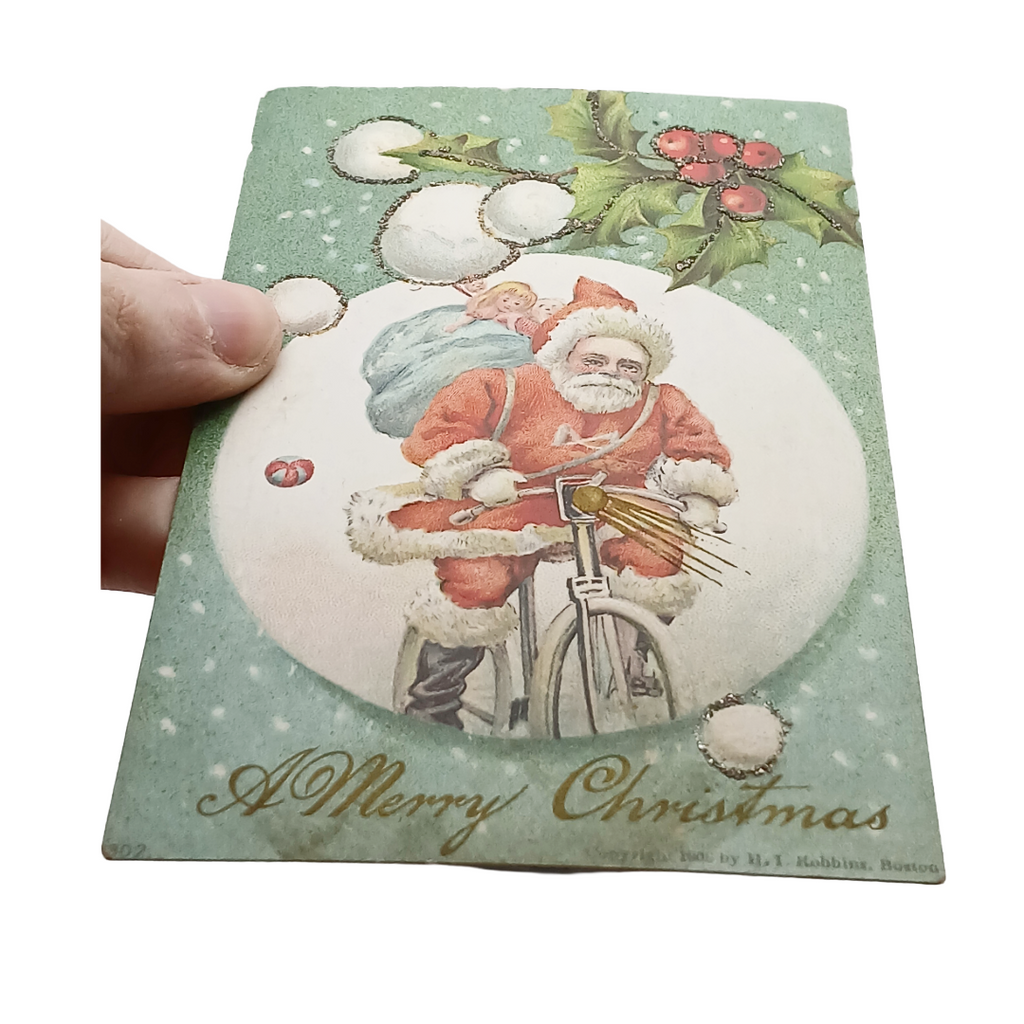 Christmas Postcard Santa Claus on Bicycle in Snow Robbins Publishing 1900s