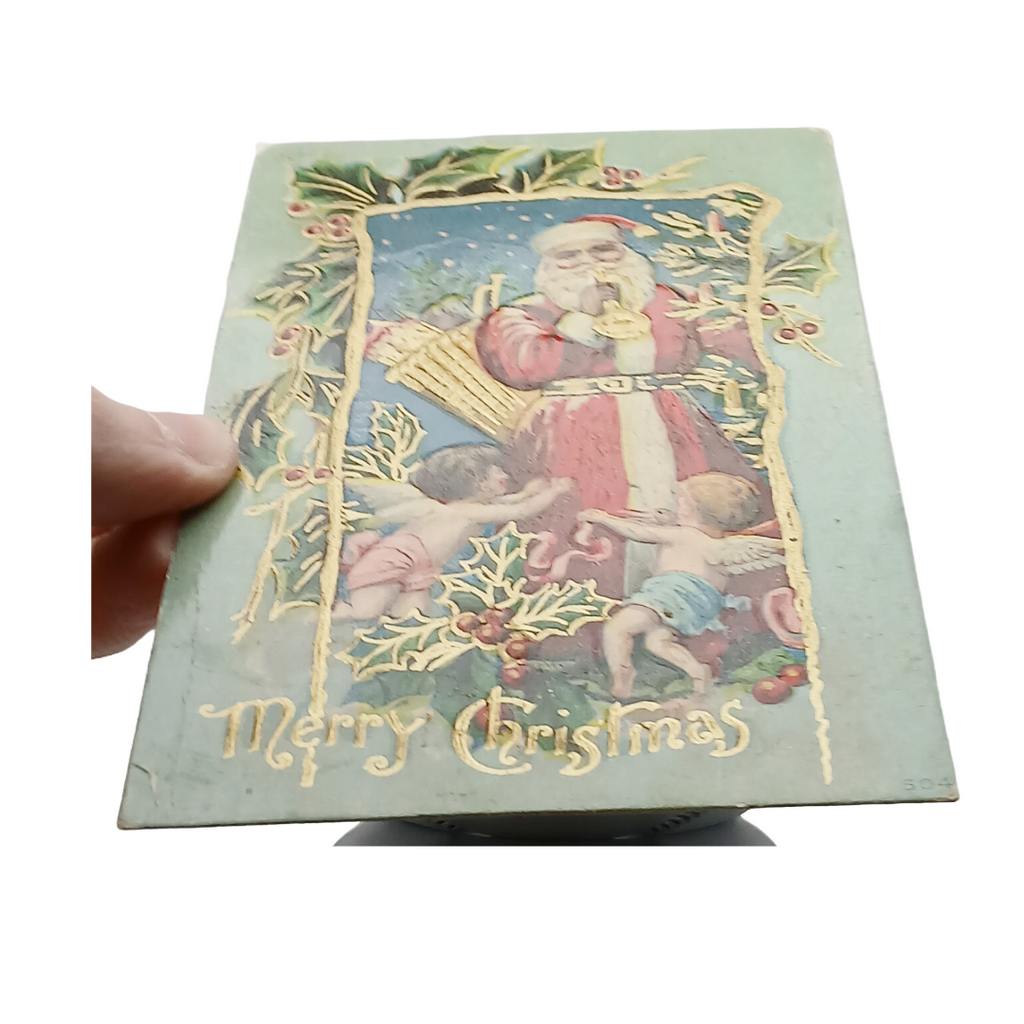 Santa Claus Christmas Postcard Saint Nick Blowing Horn with Cherubs