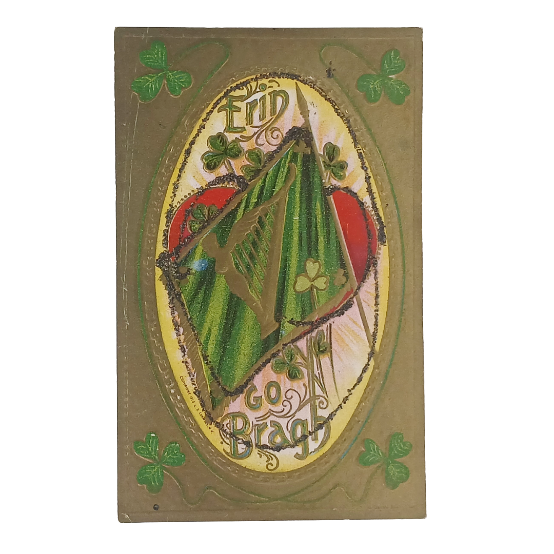Decorative card with shamrock design and text on a beige background