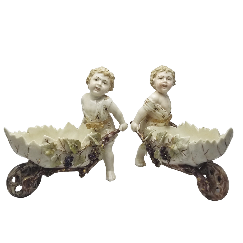Volkstedt Garden Putti Cherubs Pushing Wheelbarrows with Moving Wheels