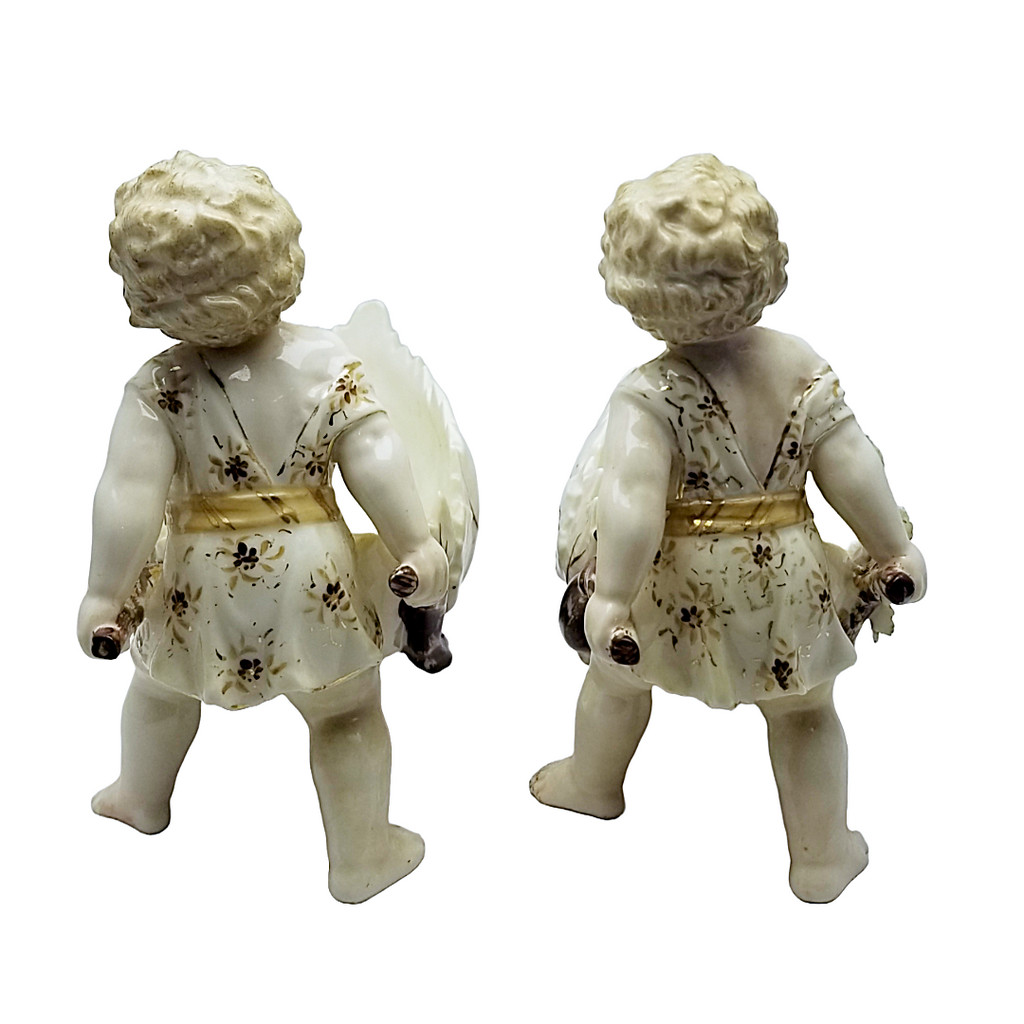 Volkstedt Garden Putti Cherubs Pushing Wheelbarrows with Moving Wheels