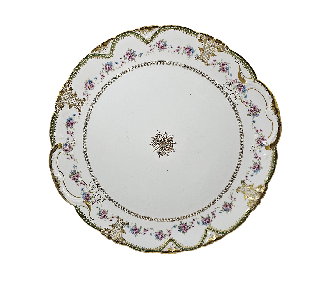 Decorative ceramic plate with floral patterns on a white background